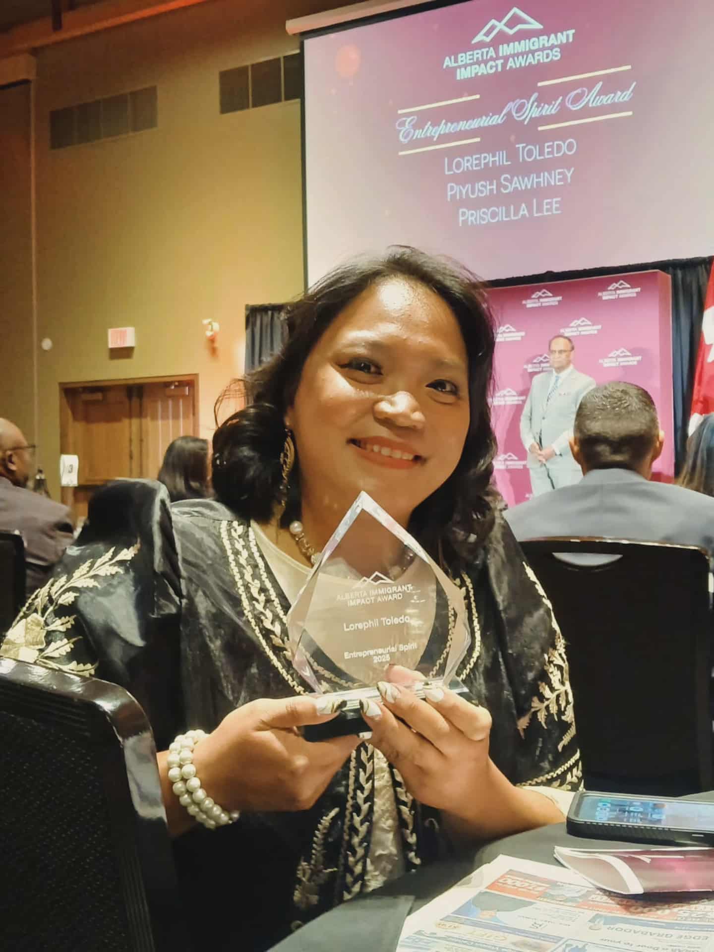 Lorephil Toledo: A True Inspiration — Honored with the Immigrant Impact Award by the Government of Alberta